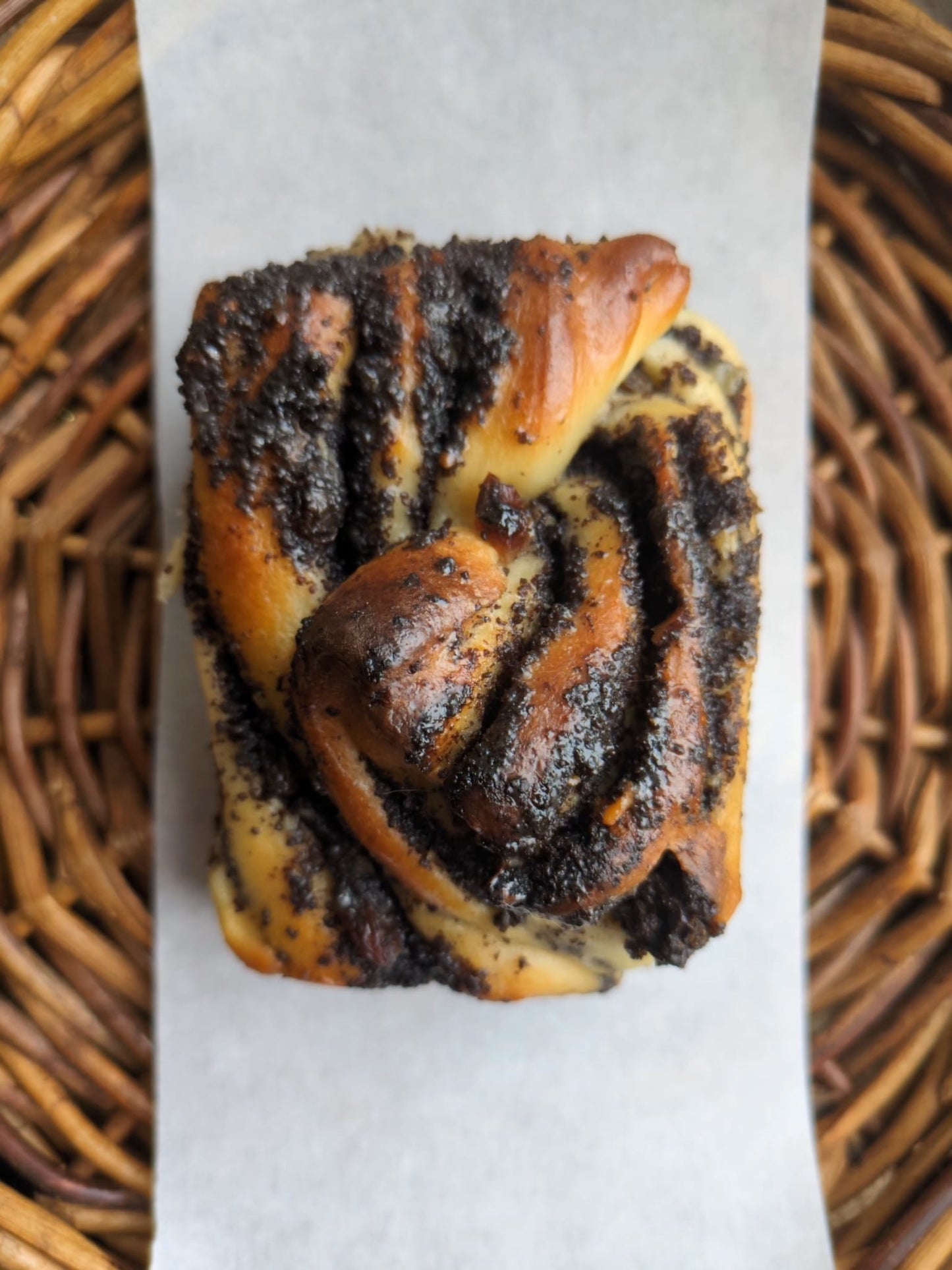 Babka bun with a swirl of poppy seed, walnut, and raisin filling